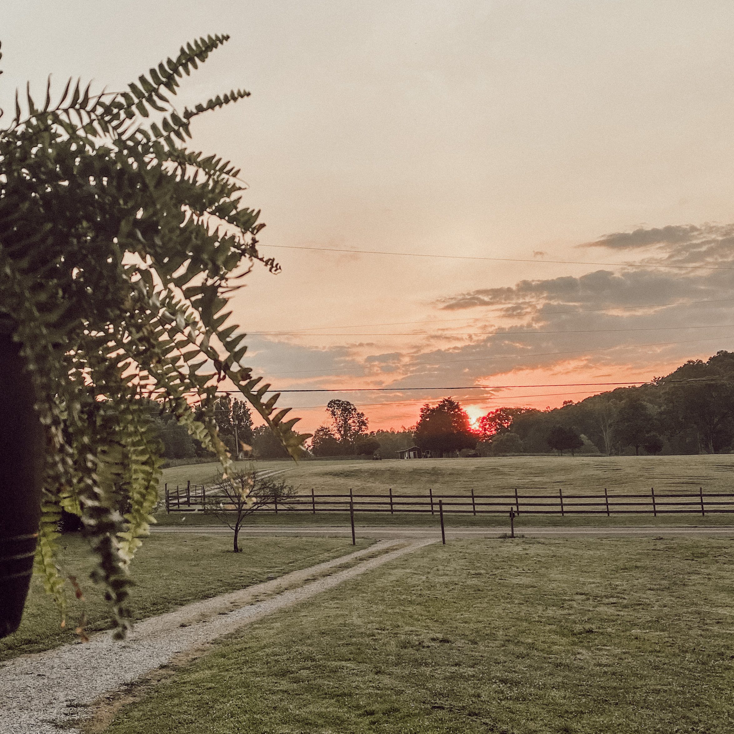 sunset over a tennessee homestead
