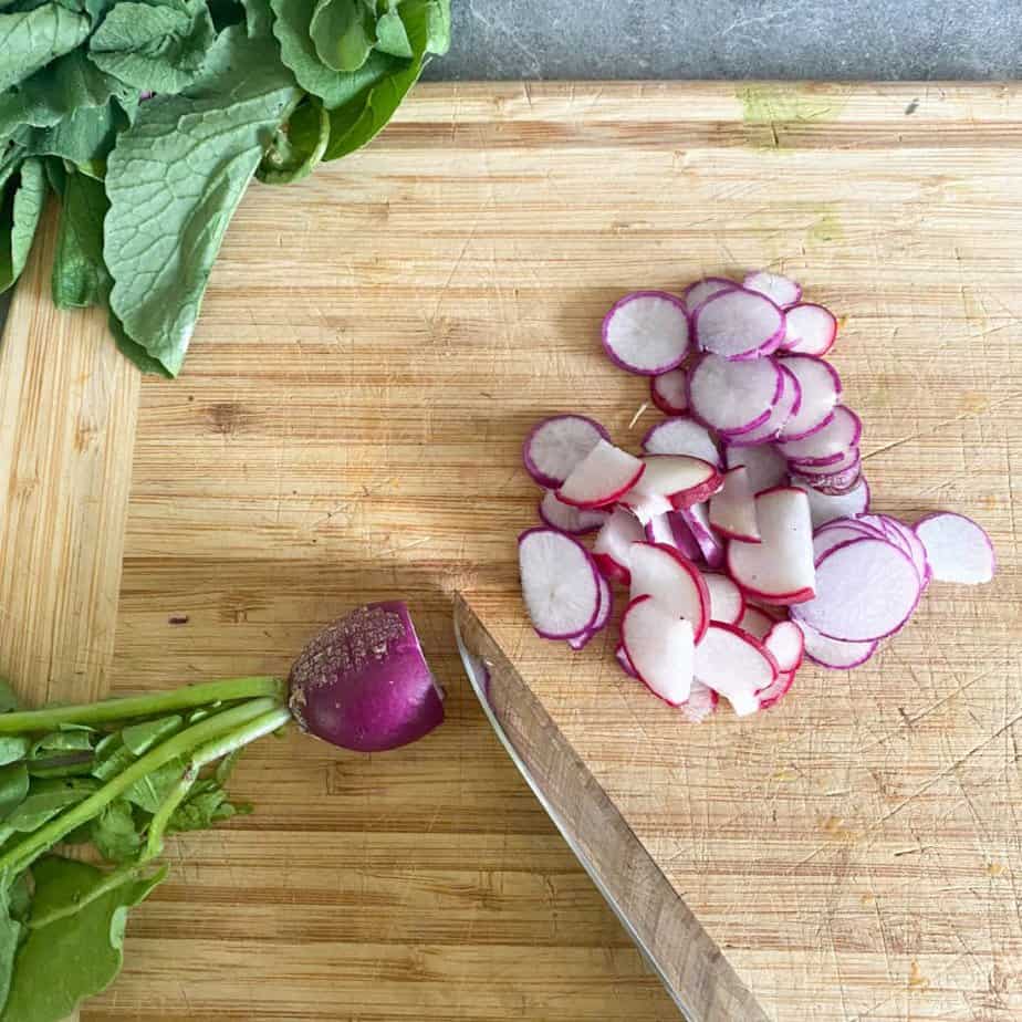 showing how to cut thinly sliced radish