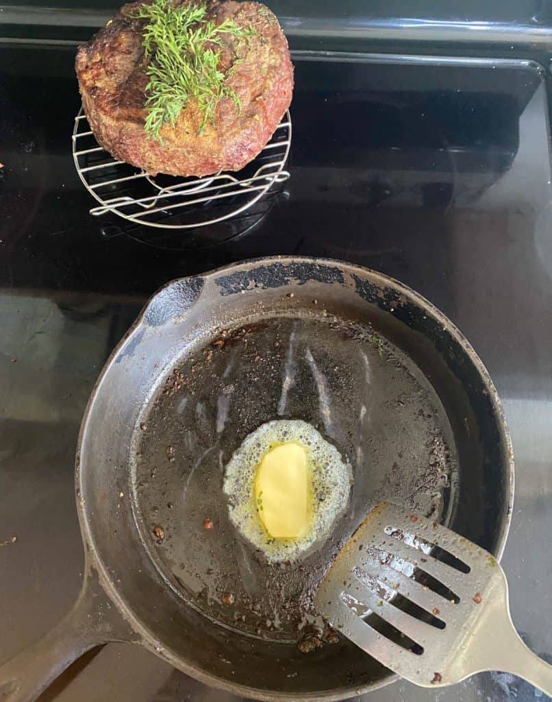 butter melting in cast iron skillet