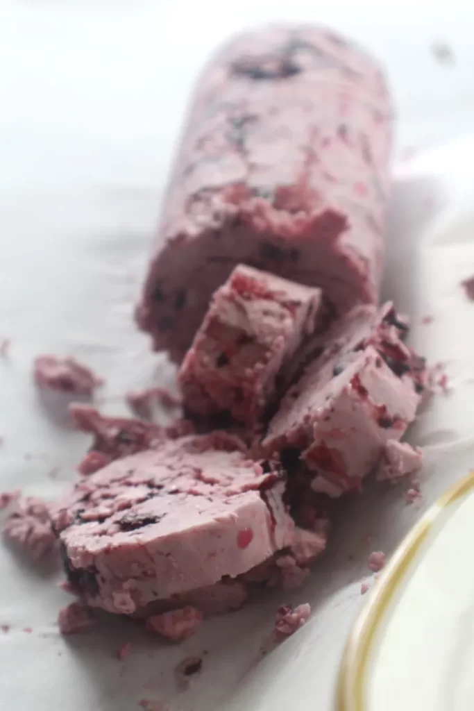 whipped blueberry butter in a log