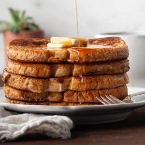 sourdough french toast topped with maple syrup and butter