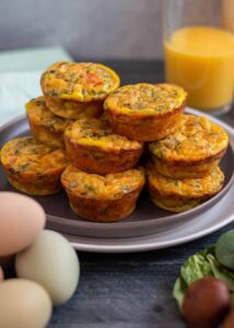 sourdough breakfast bites display with eggs and orange juice